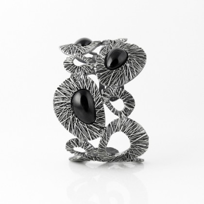 Brazalete S Aldara·O